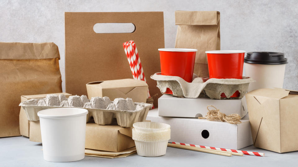 Set of various eco friendly packaging, disposable recyclable containers and tableware.