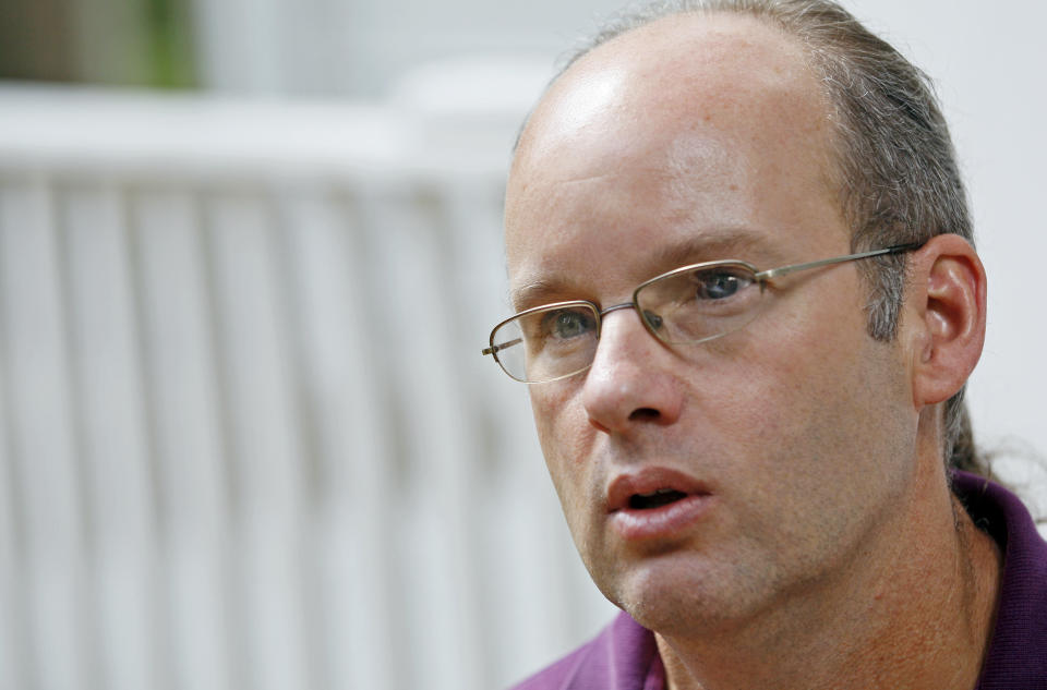 In this June 8, 2012 photograph, Jay Watson, professor of Faulkner Studies at the University of Mississippi, stands on the porch at Roan Oak, the home of the late Nobel Prize laureate William Faulkner, in Oxford, Miss., and discusses his role in American literature. The home is maintained by the university as a museum and is open to visitors year round, allowing a glimpse into the writer's complex life. (AP Photo/Rogelio V. Solis)