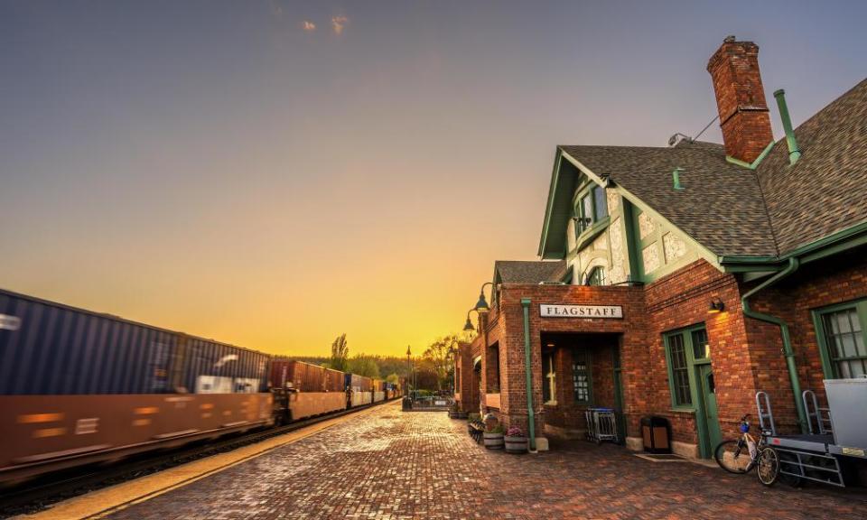 Train going through the station in Flagstaff at sunset, Arizona, US.