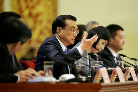 Chinese Premier Li Keqiang speaks at the news conference following the closing session of the National People's Congress (NPC), at the Great Hall of the People in Beijing, China March 20, 2018. REUTERS/Jason Lee