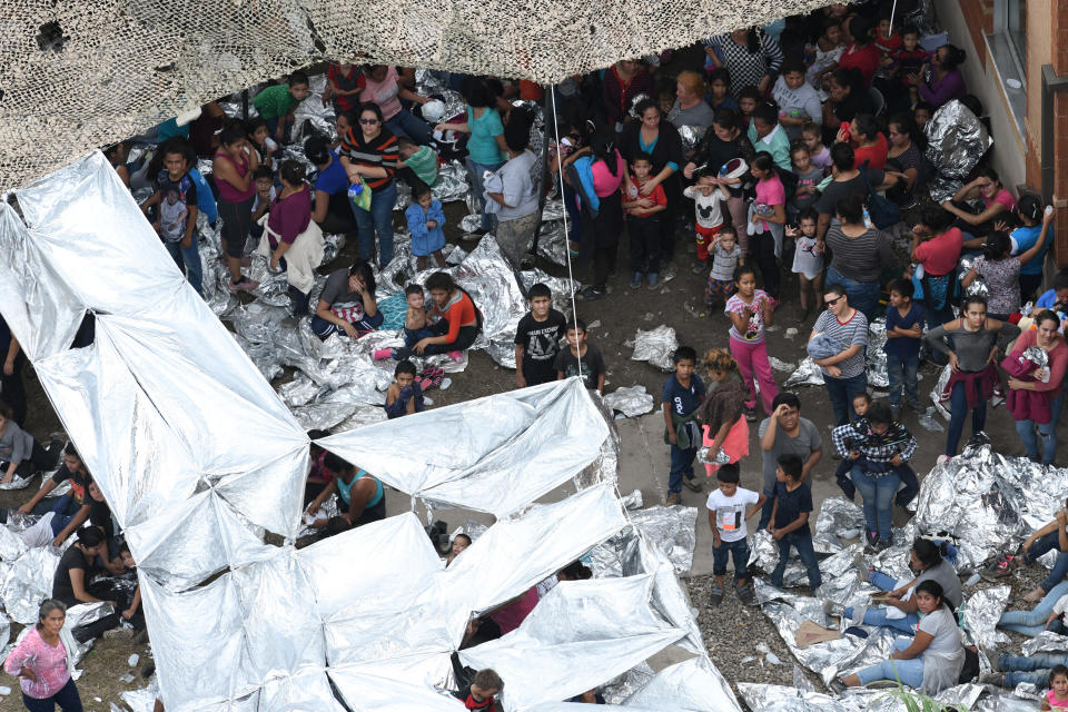 Migrants are seen outside the U.S. Border Patrol McAllen Station in a makeshift encampment in McAllen, Texas, U.S., May 15, 2019.  (Photo: Loren Elliott/Reuters)