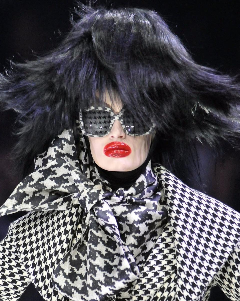 <p>Cruella De Vil gets an OTT mod overhaul courtesy of a wig taller than your front doorway.</p>