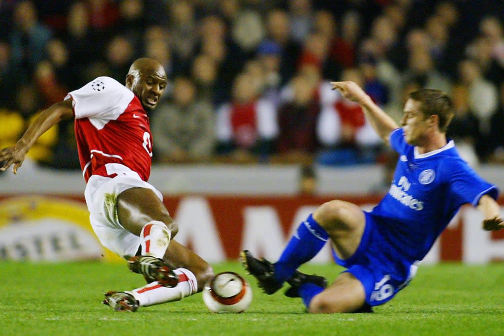 Patrick Vieira goes for the ball with Scott Parker as Arsenal and Chelsea clash in 2004  (AFP via Getty Images)