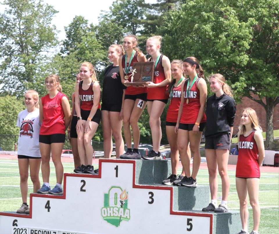 The Fairfield Union girls' track and field team stand on the podium after they earned the Division II regional runner-up trophy on Saturday, May 27, 2023 at Muskingum University.