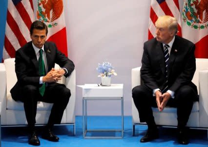 U.S. President Donald Trump meets Mexico's President Enrique Pena Nieto during the their bilateral meeting at the G20 summit in Hamburg, Germany July 7, 2017.    REUTERS/Carlos Barria