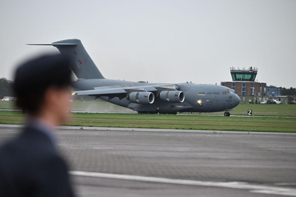 The RAF aircraft, a C-17 globemaster from 99 squadron carrying the coffin of Queen Elizabeth II lands at RAF Northolt, west London, from where it will be taken to Buckingham Palace, London, to lie at rest overnight in the Bow Room. Picture date: Tuesday September 13, 2022.