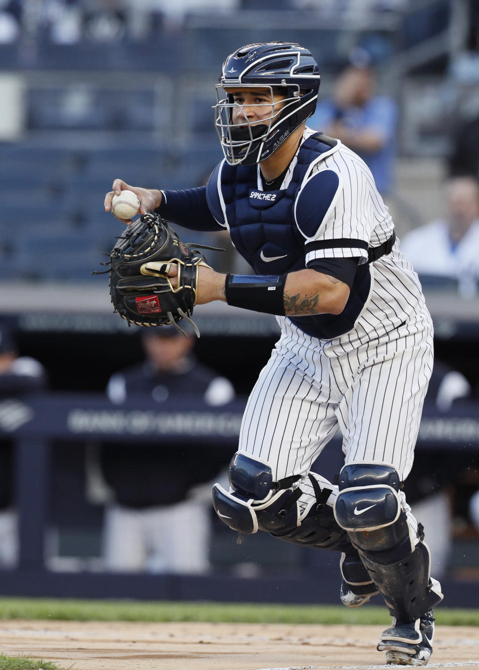 NEW YORK, NY - MAY 7:  Catcher Gary Sanchez #24 of the New York Yankees runs the ball towards third base during a rundown as Domingo Santana was caught between 3rd base and home before being tagged out in the second inning of an MLB baseball game against the Seattle Mariners on May 7, 2019 at Yankee Stadium in the Bronx borough of New York City. Yankees won 5-4. (Photo by Paul Bereswill/Getty Images)