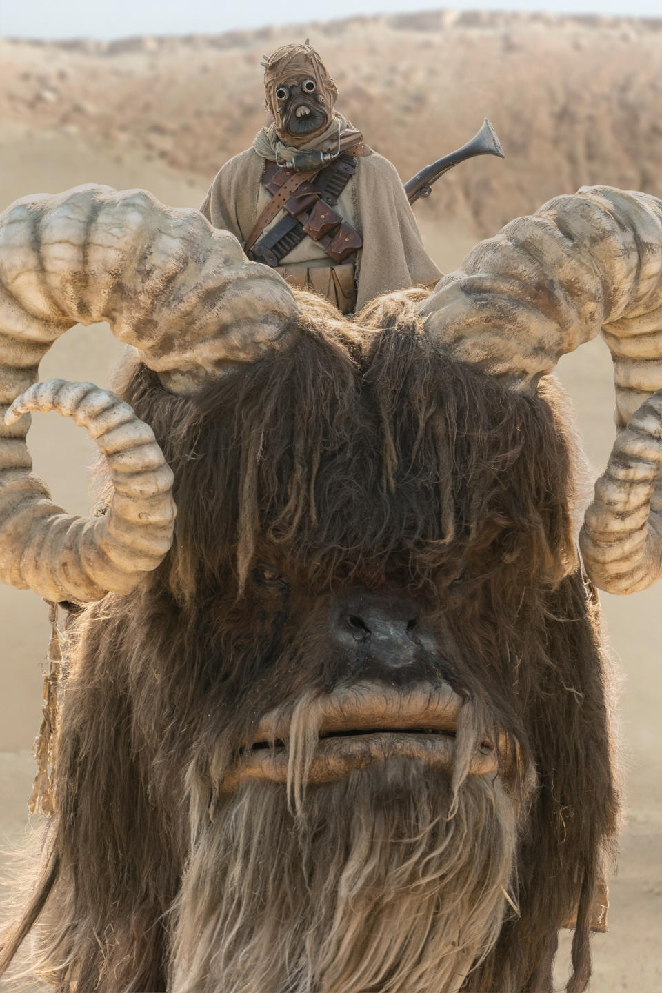 Tusken Raider and Bantha in THE MANDALORIAN, season two, exclusively on Disney+