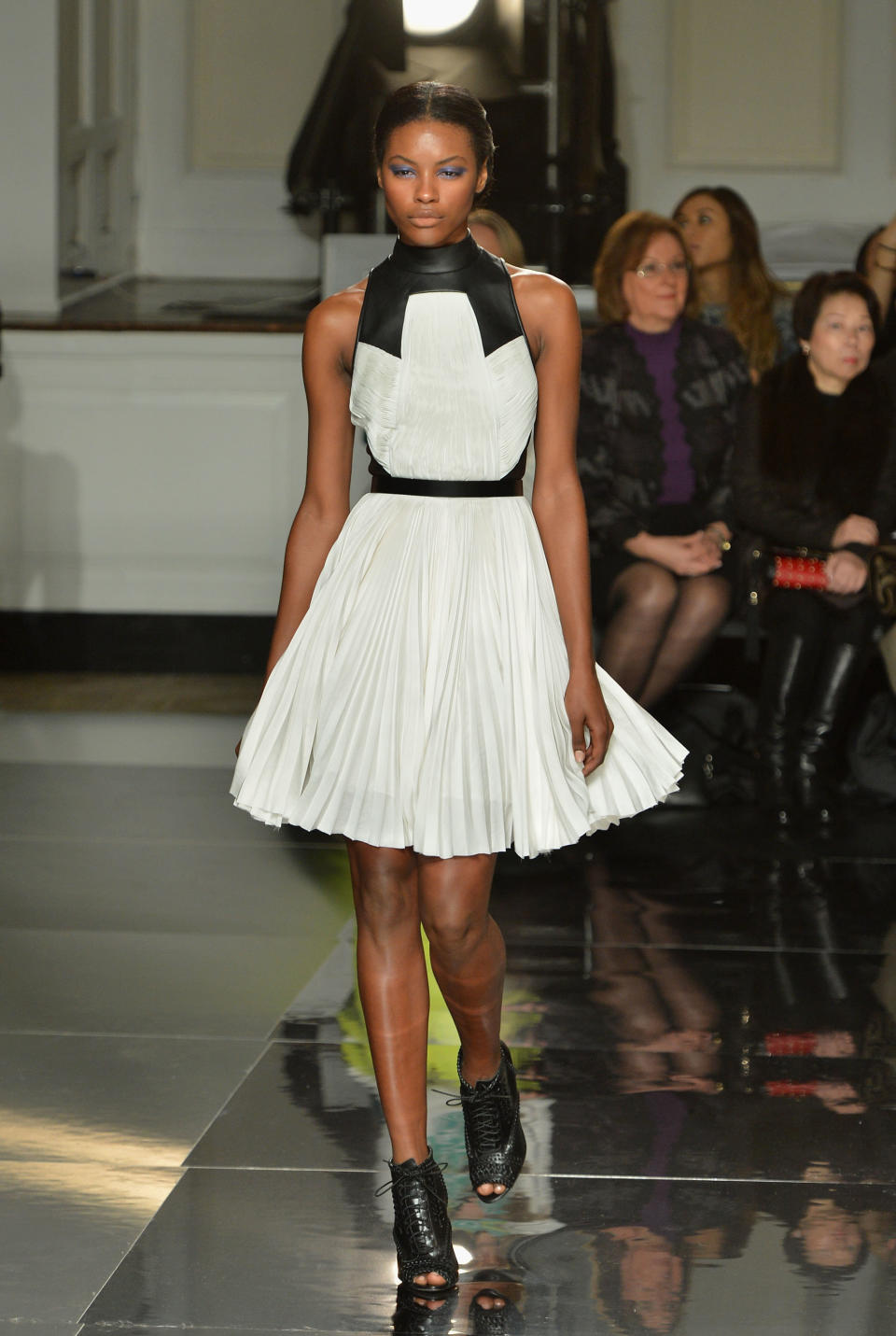 NEW YORK, NY - FEBRUARY 08:  A model walks the runway at the Jason Wu fall 2013 fashion show during Mercedes-Benz Fashion Week on February 8, 2013 in New York City.  (Photo by Slaven Vlasic/Getty Images)