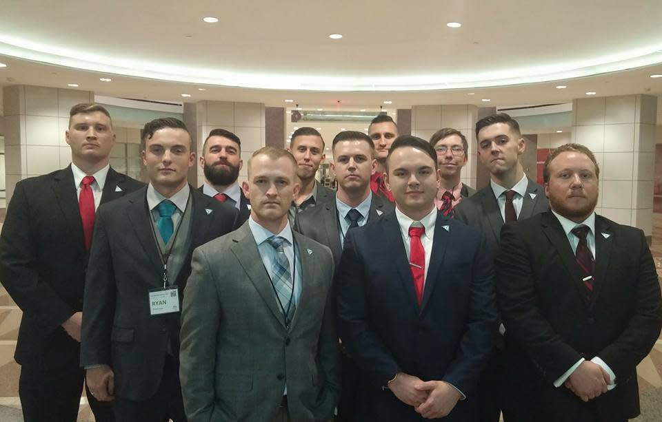 Shawn McCaffrey, in the front row wearing a red tie, poses for a photo with fellow members of the white nationalist group Identity Evropa at the 2016 National Policy Institute conference in Washington, D.C. (Photo: Twitter)