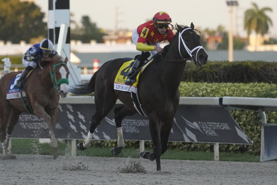 FILE - Irad Ortiz Jr., riding Life is Good, crosses the finish line during the Pegasus World Cup dirt horse race Jan. 29, 2022, at Gulfstream Park in Hallandale Beach, Fla. Unbeaten Flightline is the 3-5 favorite for the Breeders’ Cup Classic at Keeneland, Saturday, Nov. 5, 2022. Epicenter is the 5-1 second choice, with Life Is Good the 6-1 third choice. (AP Photo/Wilfredo Lee, File)