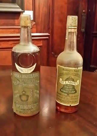 Rare bottles of Belmont (R) and Cascade Kentucky bourbon are seen at the Filson Historical Society in Louisville, Kentucky September 19, 2014. REUTERS/Steve Bittenbender