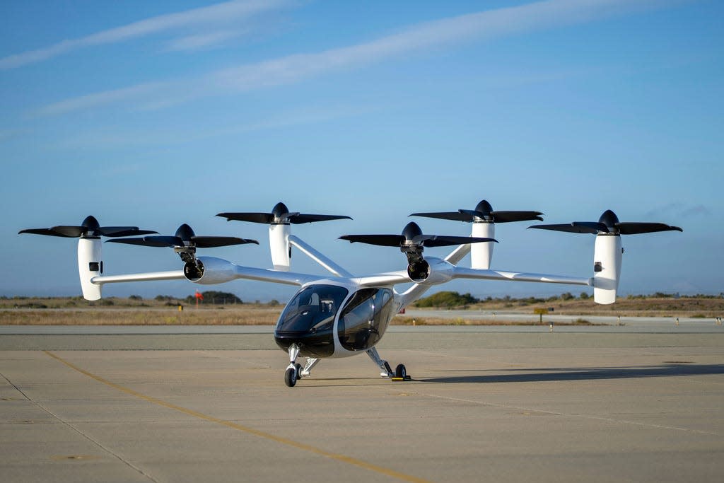 In this 2022 photo provided by Joby Aviation is Joby’s pre-production prototype aircraft at the company’s flight test facility in Marina, Calif. Joby Aviation Inc. will bring air taxi production to a 140-acre site at Dayton International Airport by 2025.