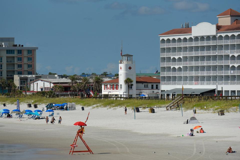 The American Red Cross lifeguard station is an iconic site on  Jacksonville Beach, seen here in July. The use of Sunday and holiday volunteer lifeguards has been a recent controversy.