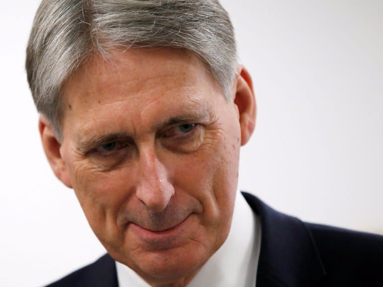 Britain's Chancellor of the Exchequer Philip Hammond visits an engineering training facility in the West Midlands, November 20, 2017. REUTERS/Andrew Yates