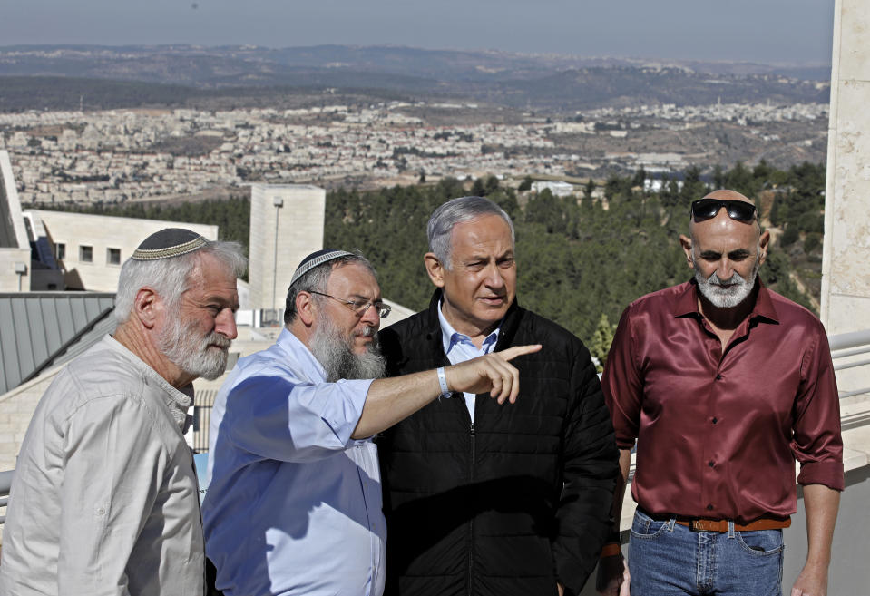 Israeli Prime Minister Benjamin Netanyahu, second right, meets with heads of Israeli settlement authorities at the Alon Shvut settlement, in the Gush Etzion block, in the occupied the West Bank, Tuesday, November 19, 2019. (Menahem Kahana/ Pool via AP)