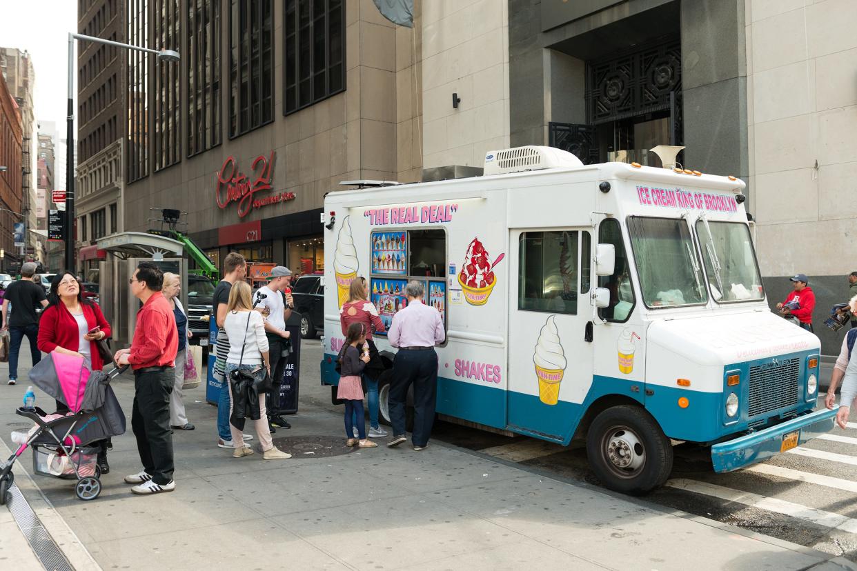 The Ice Cream King of Brooklyn parked on Cortlandt Street in Lower Manhattan with customers