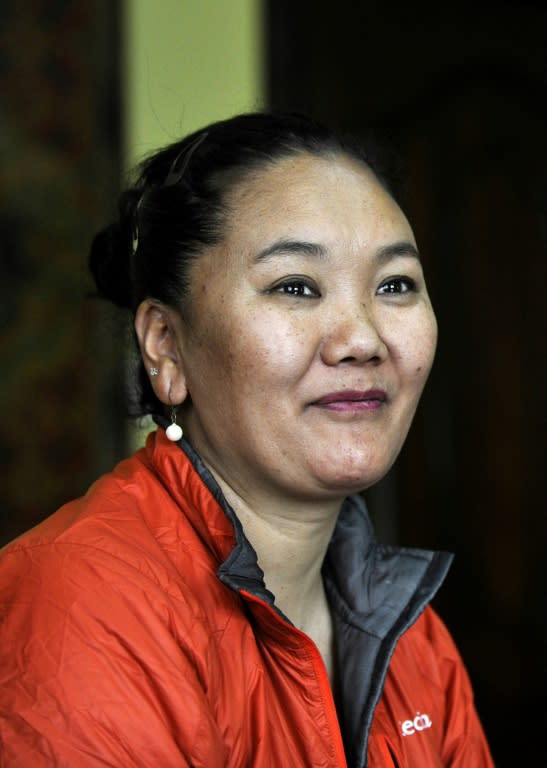 Nepali climber Lhakpa Sherpa, 48, reached the snow-capped summit for the 10th time, breaking her own record set in 2018 (AFP/PRAKASH MATHEMA)