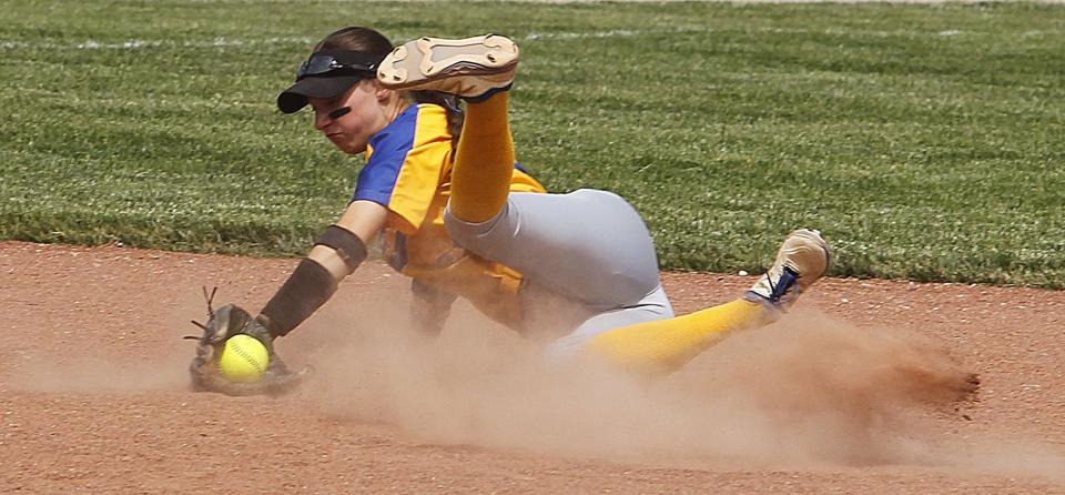 Gahanna's Kirnan Bailey makes a diving stop and throws out a Lancaster batter during a Division I regional semifinal May 25 at Centerburg.