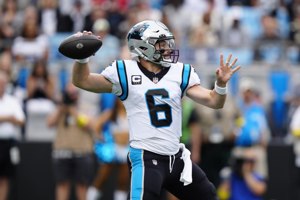 Carolina Panthers quarterback Baker Mayfield (6) sets back to pass during the first half of an NFL football game against the New Orleans Saints, Sunday, Sept. 25, 2022, in Charlotte, N.C. (AP Photo/Jacob Kupferman)