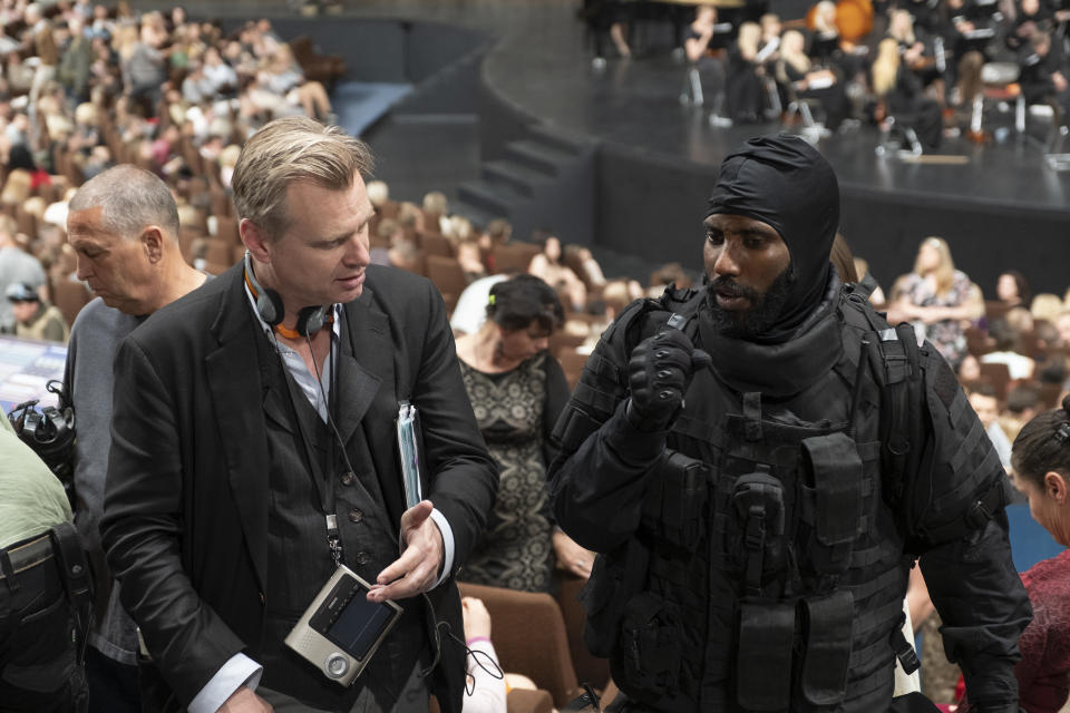 Director/writer/producer CHRISTOPHER NOLAN and JOHN DAVID WASHINGTON on the set of Warner Bros. Pictures’ action epic "TENET," a Warner Bros. Pictures release. (© 2020 Warner Bros. Entertainment Inc. All Rights Reserved.)