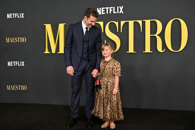 <p>Axelle/Bauer-Griffin/FilmMagic</p> Bradley Cooper and daughter Lea on Dec. 12, 2023.