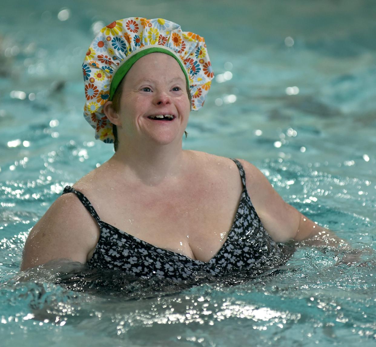 Leslie Larkins enjoys her Zumba aquatic class at the Monroe Family YMCA as she waits for the next song to play. "I like the rock band, Guns N' Roses," Larkins said.