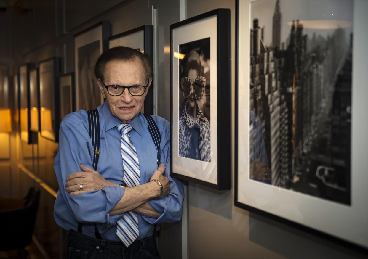 Larry King poses for photos before talking to the Daily News in 2017. Speaking to The News, he said of his old pal President Trump: "This Trump is not the Trump I know." 