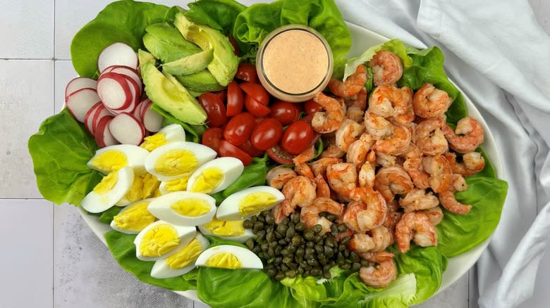 shrimp louie salad with eggs and avocado