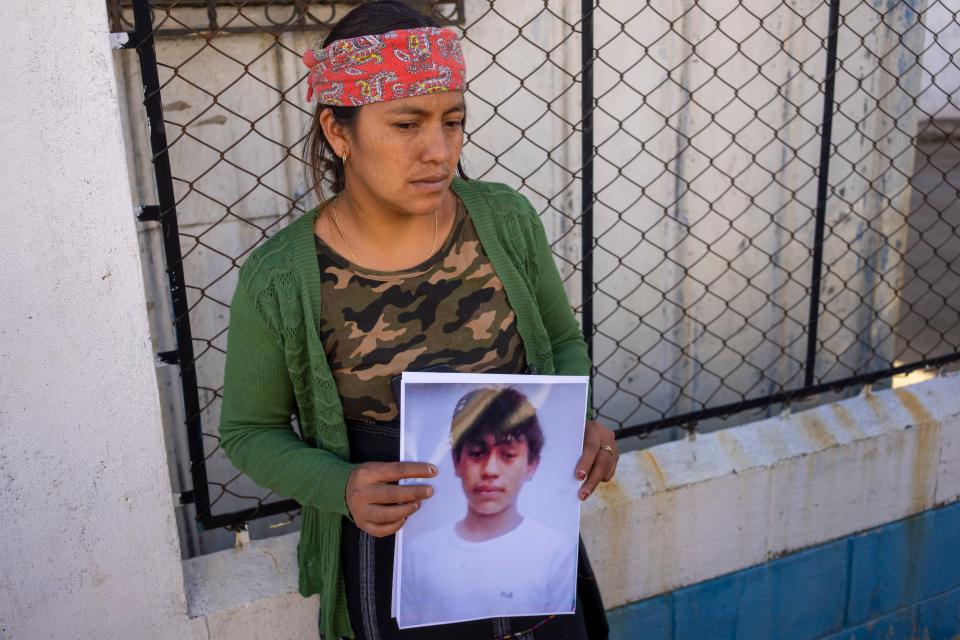 Maria Sipac Coj holds a portrait of her son Pascual Melvin Guachiac in Tzucubal, Guatemala, Wednesday, June 29, 2022 (Copyright 2022 The Associated Press. All rights reserved)