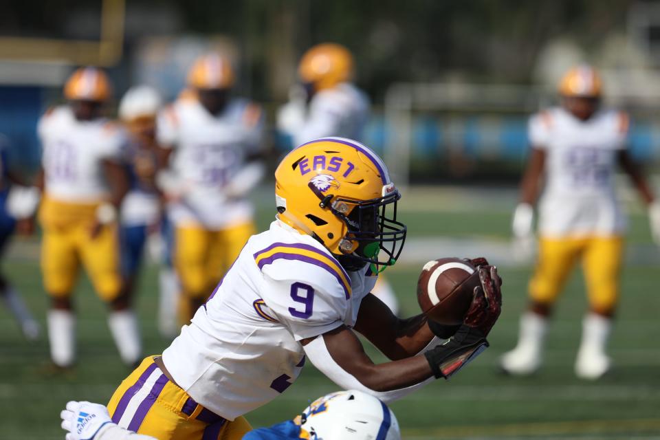 East's Ervin Wiggins catches a pass for a touchdown during East High/World of Inquiry School’s game against Irondequoit High School in Irondequoit, NY, September 10, 2022.