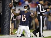 Chicago Bears wide receiver Brandon Marshall (15) celebrates after making a touchdown reception in the first half of an NFL football game against the New York Giants, Thursday, Oct. 10, 2013, in Chicago. (AP Photo/Nam Y. Huh)
