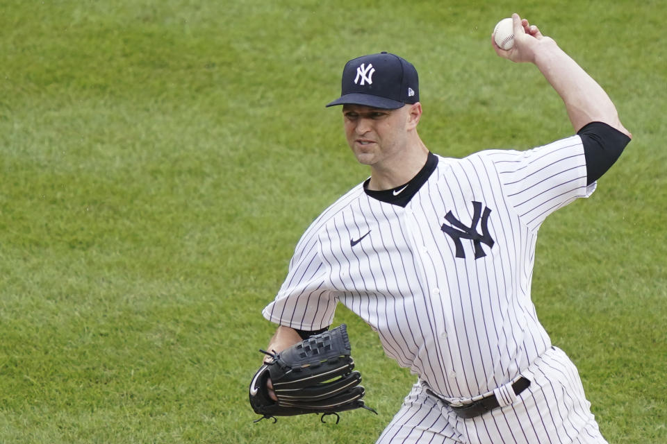 New York Yankees starting pitcher J.A. Happ throws in the second inning of a baseball game against the New York Mets, Saturday, Aug. 29, 2020, in New York. (AP Photo/John Minchillo)