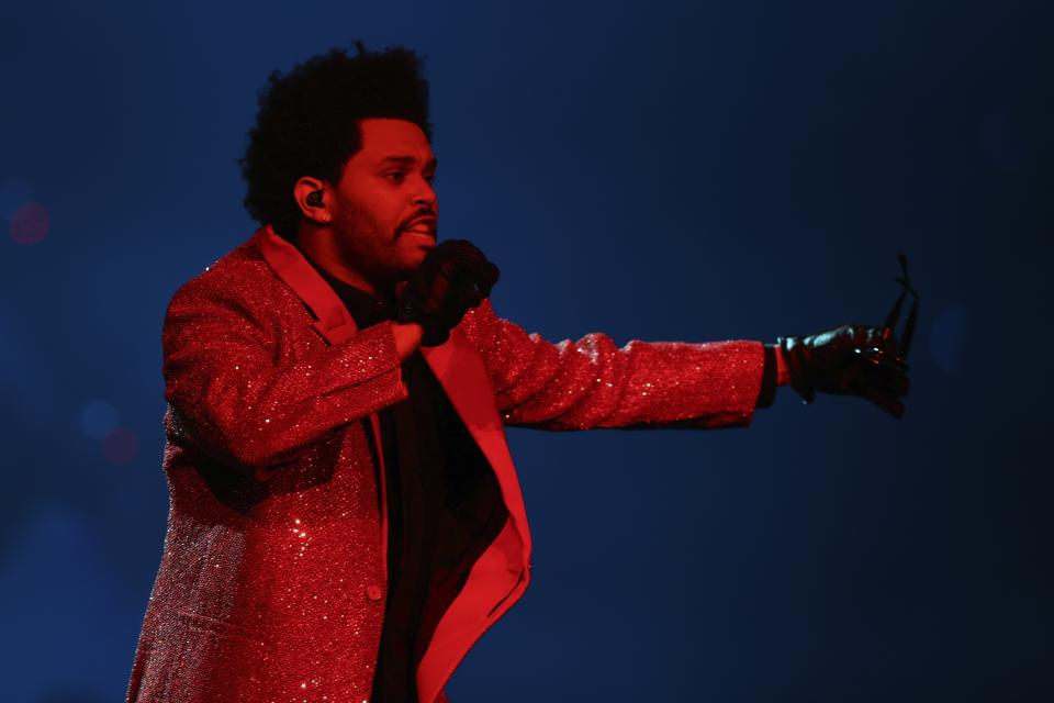 The Weeknd performs during the halftime show at the NFL Super Bowl 55 football game between the Kansas City Chiefs and Tampa Bay Buccaneers, Sunday, Feb. 7, 2021, in Tampa, Fla. (AP Photo/Mark LoMoglio)