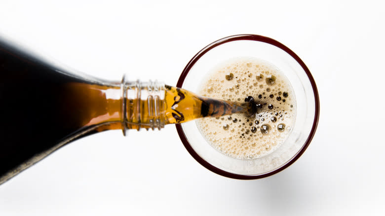 Soda pouring into a glass