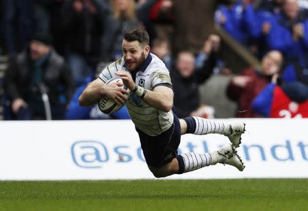 Britain Rugby Union - Scotland v Italy - Six Nations Championship - BT Murrayfield Stadium, Edinburgh, Scotland - 18/3/17 Scotland's Tommy Seymour (R) scores their fourth try Action Images via Reuters / Lee Smith Livepic