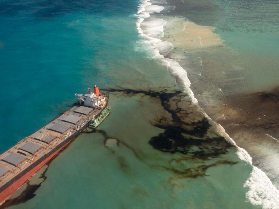 Oil leaks from the MV Wakashio, a bulk carrier ship that recently ran aground off the southeast coast of Mauritius: AP