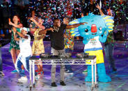 Gold Coast 2018 Commonwealth Games - Closing Ceremony - Carrara Stadium - Gold Coast, Australia - April 15, 2018. Former Jamaican sprinter Usain Bolts plays the DJ desks during the closing ceremony. REUTERS/David Gray