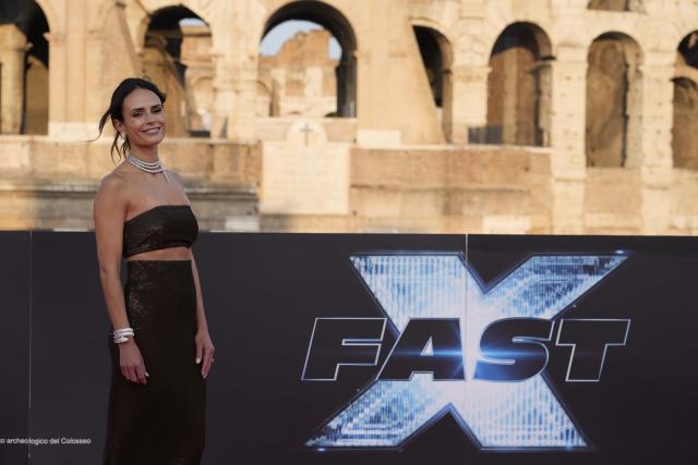 Jordana Brewster poses for photographers upon arrival at the world premiere of the film 'Fast X' in Rome, Friday, May 12, 2023. (AP Photo/Gregorio Borgia)