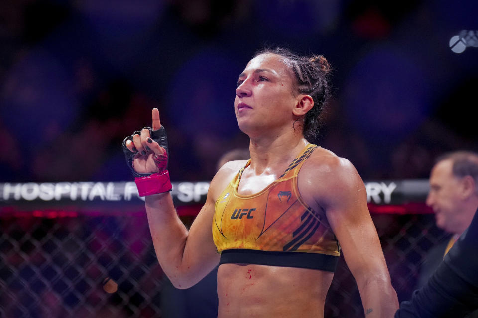 Jun 24, 2023; Jacksonville, Florida, USA; Amanda Ribas (red gloves) fights Maycee Barber (blue gloves) in a women flyweight bout during UFC Fight Night at VyStar Veterans Memorial Arena. Mandatory Credit: David Yeazell-USA TODAY Sports