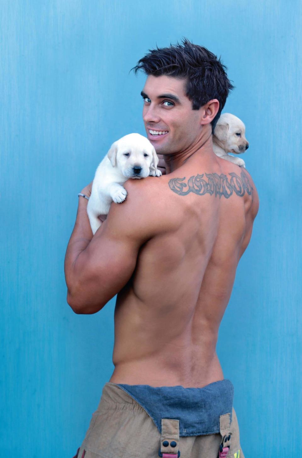 Half-naked firefighters strike a pose for charity calendar