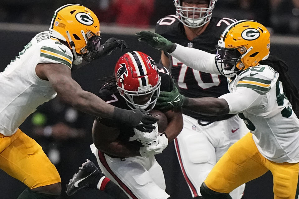 Atlanta Falcons running back Bijan Robinson (7) runs against the Green Bay Packers during the first half of an NFL football game, Sunday, Sept. 17, 2023, in Atlanta. (AP Photo/Brynn Anderson)