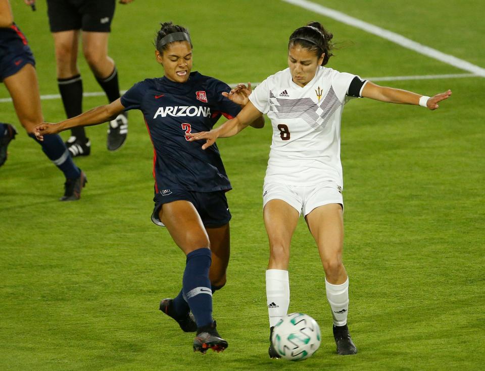 April 16, 2021; Tempe, Arizona, USA; ASU's Alexia Delgado (8) dribbles against Arizona's Ava McCray (3) during the final home game at Sun Devil Stadium. Mandatory Credit: Patrick Breen-Arizona Republic