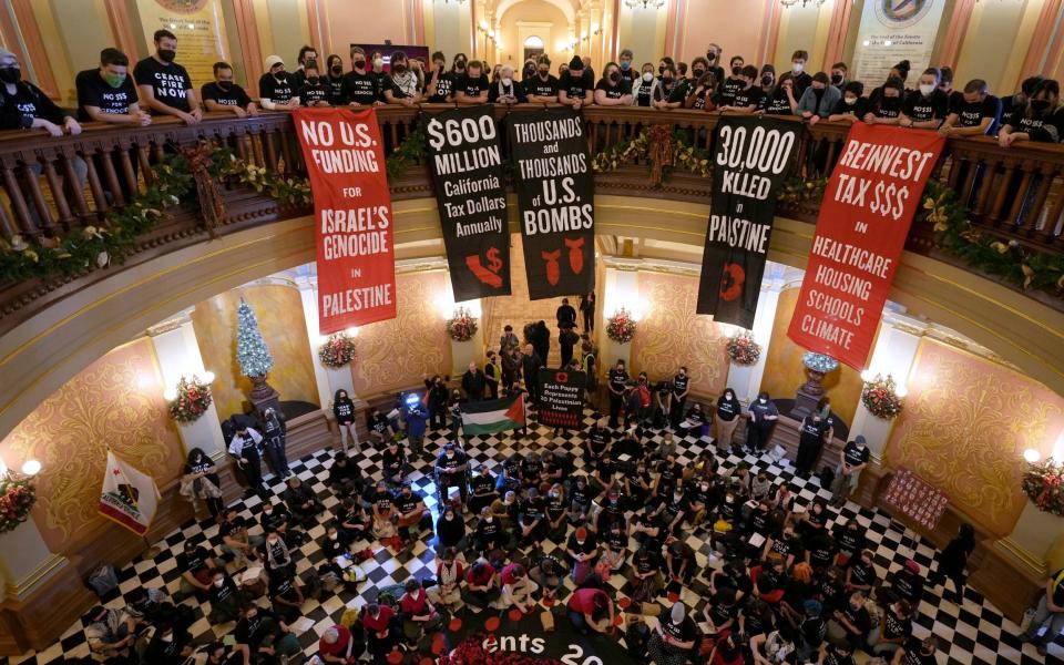 Protesters calling for a ceasefire in Gaza gather in the rotunda of the Capitol