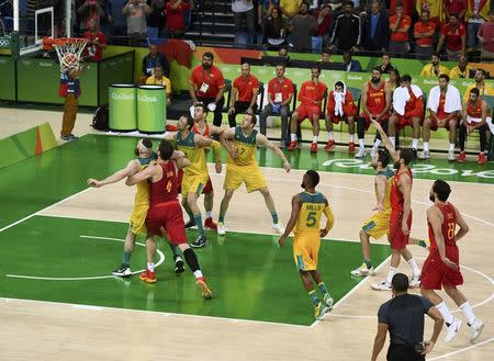 2016 Rio Olympics - Basketball - Final - Men's Bronze Medal Game - Carioca Arena 1 - Rio de Janeiro, Brazil - 21/8/2016. Sergio Rodriguez (ESP) of Spain shoots game winning free throws after being fouled by Patty Mills (AUS) of Australia. REUTERS/Dylan Martinez