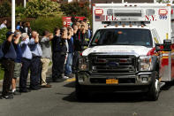 <p>Emergency personnel salute as an ambulance carries the body of fire battalion chief Michael Fahy, who was killed in an explosion at a home in Bronx, away from the NewYork-Presbyterian on Sept. 27, 2016. (REUTERS/Lucas Jackson) </p>