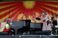 Theresa Andersson and Allen Toussaint perfrom a duet at the New Orleans Jazz and Heritage Festival in New Orleans, Saturday, May 5, 2012. (AP Photo/Gerald Herbert)