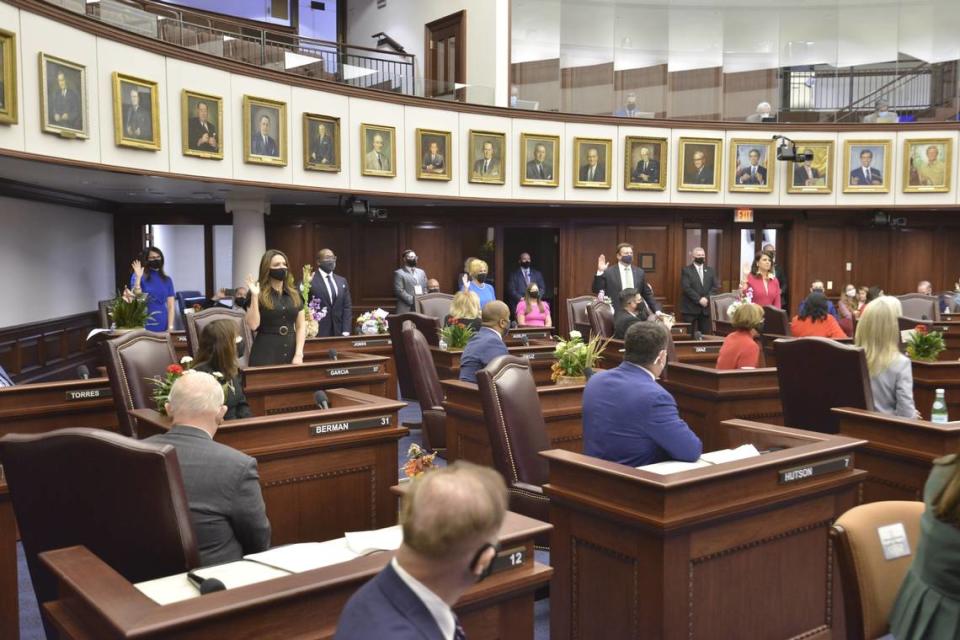 Newly elected members of the Florida Senate take the oath of office in the Senate chamber on Tuesday, Nov. 17, 2020, at the Capitol in Tallahassee, FL. New Miami-Dade Senator Ileana Garcia is at the far left.