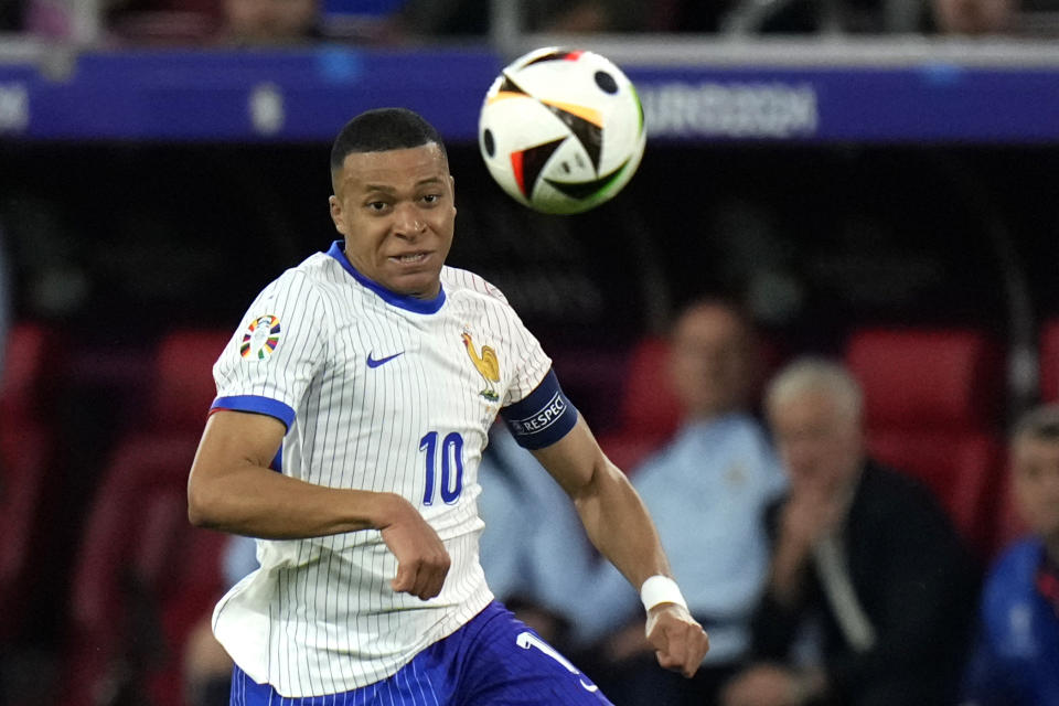 FILE - Kylian Mbappe of France controls the ball during a Group D match between Austria and France at the Euro 2024 soccer tournament in Duesseldorf, Germany, Monday, June 17, 2024. (AP Photo/Alessandra Tarantino, File)