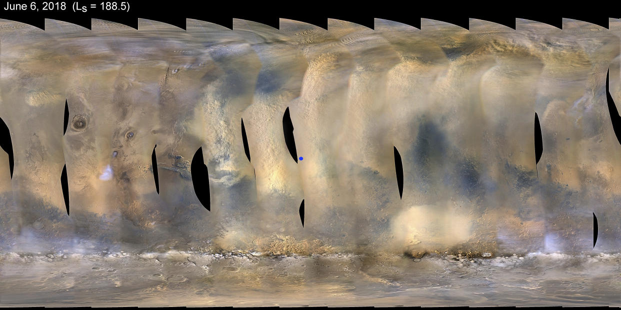 A global map of Mars with a growing dust storm. The blue dot at centre indicates the approximate location of the Opportunity rover (Nasa/JPL-Caltech/MSSS/AP)